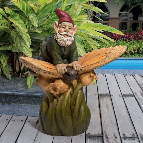 ON A BUTTERFLYS BACK GNOME STATUE
